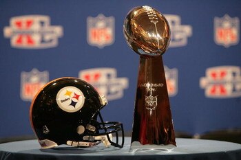 DETROIT - FEBRUARY 03:  A helmit AFC Champion Pittsburgh Steelers is pictured with the Lombardi Trophy in between press conferences at the Renaissance Center on February 3, 2006 in Detroit, Michigan.  (Photo by Andy Lyons/Getty Images)