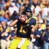 BERKELEY, CA - OCTOBER 25: Quarterback Kevin Riley #13 of the Cal Golden Bears drops back to pass during the second quarter against the UCLA Bruins at Memorial Stadium on October 25, 2008 in Berkeley, California. (Photo by Jeff Gross/Getty Images)