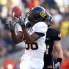 CORVALLIS, OR - NOVEMBER 15:  Verran Tucker #86 of the California Golden Bears attempts to catch a pass against Greg Laybourn #44 of the Oregon State Beavers at Reser Stadium on November 15, 2008 in Corvalis, Oregon.  (Photo by Jonathan Ferrey/Getty Image