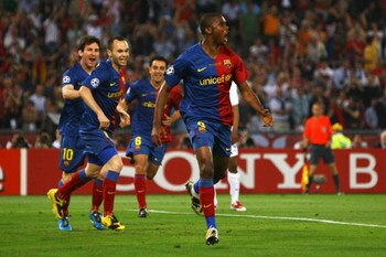 ROME - MAY 27:  Samuel Eto'o of Barcelona celebrates after he scored the first goal for Barcelona during the UEFA Champions League Final match between Manchester United and Barcelona at the Stadio Olimpico on May 27, 2009 in Rome, Italy.  (Photo by Alex L
