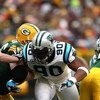GREEN BAY, WI - NOVEMBER 30:  Julius Peppers #90 of the Carolina Panthers rushes the passer against the Green Bay Packers at Lambeau Field on November 30, 2008 in Green Bay, Wisconsin. The Panthers won 35-31.  (Photo by Jonathan Daniel/Getty Images)