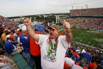 ORLANDO, FL - JANUARY 01:  Gator Fan John Martin tries to get fans to cheer louder as the Michigan Wolverines take on the Florida Gators in the Capital One Bowl at Florida Citrus Bowl on January 1, 2008 in Orlando, Florida. Michigan defeated Florida 41-35