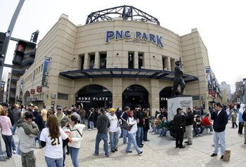 PITTSBURGH - APRIL 13:  Fans enter the ballpark and receive free caps on opening day for the Pittsburgh Pirates prior to playing the Houston Astros at PNC Park April 13, 2009 in Pittsburgh, Pennsylvania.  (Photo by Gregory Shamus/Getty Images)