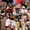 NEW ORLEANS - SEPTEMBER 25:  Wide Receiver Joe Horn #87 of the New Orleans Saints runs away from Michael Boley #59 of the Atlanta Falcons during the third quarter of the Monday Night Football game on September 25, 2006 at the Superdome in New Orleans, Lou