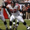 Atlanta Falcons center Todd McClure sets to block against the Tampa Bay Buccaneers  December 24, 2005 in Tampa.  The Bucs defeated the Falcons 27 - 24 in overtime.  (Photo by Al Messerschmidt/Getty Images)