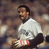 FLUSHING, NY - OCTOBER 27:  Jim Rice #14 of the Boston Red Sox stands on the field during Game seven of the 1986 World Series against the New York Mets at Shea Stadium on October 27, 1986 in Flushing, New York. The Mets defeated the Red Sox 8-5 to win the