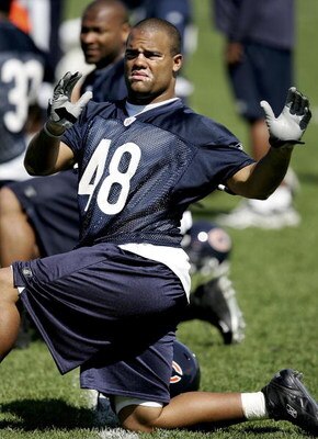 LAKE FOREST, IL - JUNE 2:  Fullback J.D. Runnels #48 of the Chicago Bears stretches during a mini-camp practice on June 2, 2006 at Halas Hall in Lake Forest, Illinois.  (Photo by Jonathan Daniel/Getty Images)