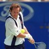 ATHENS - AUGUST 12:  Men's coach Pat McEnroe listens to questions during a press conference held by the USA Olympic tennis team on August 12, 2004 during the Athens 2004 Summer Olympic Games at the Main Press Center in Athens, Greece.  (Photo by Scott Hal