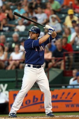 ARLINGTON, TX - JULY 09:  Frank Catalanotto #27 of the Texas Rangers at bat against the Los Angeles Angels of Anaheim on July 9, 2008 at Rangers Ballpark in Arlington, Texas.  (Photo by Ronald Martinez/Getty Images)