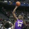 AUBURN HILLS, MI - JUNE 15:  Shaquille O'Neal #34 of the Los Angeles Lakers shoots over Ben Wallace #3 of the Detroit Pistons in the first quarter of game five of the 2004 NBA Finals on June 15, 2004 at The Palace of Auburn Hills in Auburn Hills, Michigan