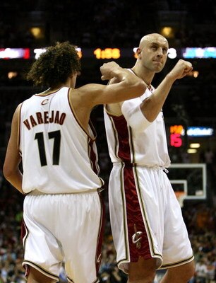 CLEVELAND - MAY 28:  Zydrunas Ilgauskas #11 and Anderson Varejao #17 of the Cleveland Cavaliers react after a play against the Orlando Magic in Game Five of the Eastern Conference Finals during the 2009 Playoffs at Quicken Loans Arena on May 28, 2009 in C