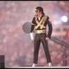 31 Jan 1993:  Singer Michael Jackson performs during halftime at Super Bowl XXVII between the Dallas Cowboys and the Buffalo Bills at the Rose Bowl in Pasadena, California.  The Cowboys won the game, 52-17. Mandatory Credit: Mike Powell  /Allsport
