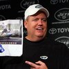 FLORHAM PARK, NJ - MAY 02:  Head coach Rex Ryan of the New York Jets holds up a picture of rookie running back Shonn Greene as he speaks to the media during minicamp on May 2, 2009 at the Atlantic Health Jets Training Center in Florham Park, New Jersey.  