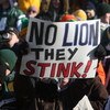 GREEN BAY, WI - DECEMBER 28:  A fan holds a sign during a game between the Green Bay Packers and the Detroit Lions on December 28, 2008 at Lambeau Field in Green Bay, Wisconsin. The Packers defeated the Lions 31-21.  (Photo by Jonathan Daniel/Getty Images