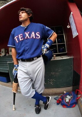 PHOENIX - JUNE 23:  Ian Kinsler #5 of the Texas Rangers stands in the dugout before the major league baseball game against the Arizona Diamondbacks at Chase Field on June 23, 2009 in Phoenix, Arizona. The Diamondbacks defeated the Rangers 8-2.  (Photo by 
