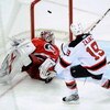 RALEIGH, NC - APRIL 19:  Travis Zajac #19 of the New Jersey Devils celebrates after scoring the game-wining goal in overtime against the Carolina Hurricanes during Game Three of the Eastern Conference Quarterfinals of the 2009 Stanley Cup Playoffs on Apri