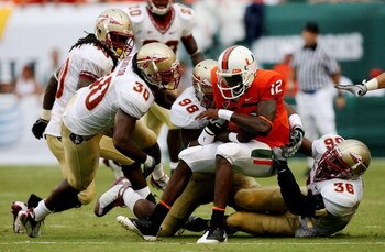 COLLEGE PARK, MD - NOVEMBER 22: Chris Turner #10 of the Maryland Terrapins is sacked by Everette Brown #99 of the Florida State Seminoles on November 22, 2008 at Byrd Stadium in College Park, Maryland. (Photo by Jim McIsaac/Getty Images)