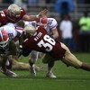 TALLAHASSEE, FL - NOVEMBER 29:  Receiver Jeffrey Demps #2 of the Florida Gators is brought down by linebacker Dekoda watson #36 of the Florida State Seminoles during the first half at Bobby Bowden Field at Doak Campbell Stadium on November 29, 2008 in Tal