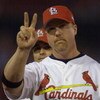12 Oct 2001: Mark McGwire #25 of the St.Louis Cardinals salutes the crowd during team introductions before their game against the Arizona Diamondbacks at Busch Stadium in St. Louis, Missouri. DIGITAL IMAGE. Mandatory Credit: Elsa/ALLSPORT