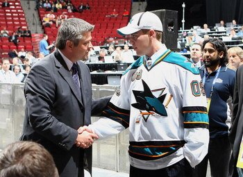 MONTREAL, QC - JUNE 27:  William Wrenn of the San Jose Sharks greets members of the front office after being drafted by the Sharks in the second round during the 2009 NHL Entry Draft at the Bell Centre on June 27, 2009 in Montreal, Quebec, Canada. (Photo 
