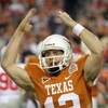 GLENDALE, AZ - JANUARY 05:  Quarterback Colt McCoy #12 of the Texas Longhorns celebrates after throwing a 7 yard touchdown reception against the Ohio State Buckeyes during the third quarter of the Tostitos Fiesta Bowl Game on January 5, 2009 at University