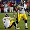 TAMPA, FL - FEBRUARY 01:  Quarterback Ben Roethlisberger #7 of the Pittsburgh Steelers is helped up by teammate Max Starks #78 against the Arizona Cardinals during Super Bowl XLIII on February 1, 2009 at Raymond James Stadium in Tampa, Florida.  (Photo by