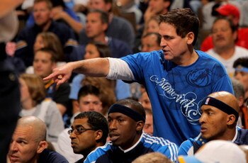 DENVER - MAY 03:  Mark Cuban, owner of the Dallas Mavericks, reacts from behind the team bench as they face the Denver Nuggets in Game One of the Western Conference Semifinals during the 2009 NBA Playoffs at Pepsi Center on May 3, 2009 in Denver, Colorado