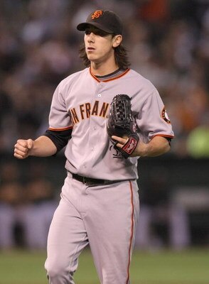 OAKLAND, CA - JUNE 23:  Tim Lincecum #55 of the San Francisco Giants pumps his fist against the Oakland Athletics during a Major League Baseball game on June 23, 2009 at the Oakland Coliseum in Oakland, California.  (Photo by Jed Jacobsohn/Getty Images)