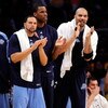 LOS ANGELES, CA - APRIL 27:  (lL-R) Deron Williams #8, Jarron Collins #31 and Carlos Boozer #5 of the Utah Jazz cheer on their team in the fourth quarter against the Los Angeles Lakers in Game Five of the Western Conference Quarterfinals during the 2009 N