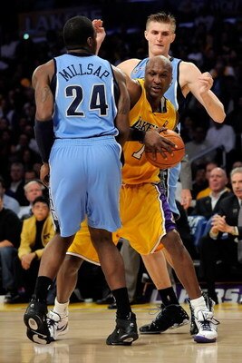 LOS ANGELES, CA - APRIL 27:  Lamar Odom #7 of the Los Angeles Lakers is double-teammed by Paul Millsap #24 and Andrei Kirilenko #47 of the Utah Jazz in the second quarter of Game Five of the Western Conference Quarterfinals during the 2009 NBA Playoffs at
