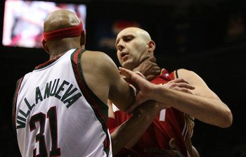 MILWAUKEE - FEBRUARY 20: Charlie Villanueva #31 of the Milwaukee Bucks grabs Zydrunas Ilgauskas #11 of the Cleveland Cavaliers by the throat on February 20, 2009 at the Bradley Center in Milwaukee, Wisconsin. The Cavaliers defeated the Bucks 111-103. NOTE