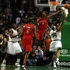 BOSTON - NOVEMBER 10:  Paul Pierce #34 of the Boston Celtics makes the shot despite the best effort of Chris Bosh #4 of the Toronto Raptors on November 10,  2008 at TD Banknorth Garden in Boston, Massachusetts. Kendrick Perkins of the Celtics and Jermaine