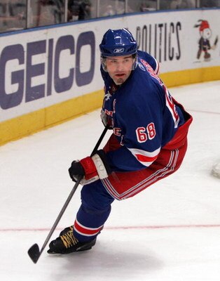 NEW YORK - MARCH 04:  Jaromir Jagr #68 of the New York Rangers skates against the New York Islanders on March 4, 2008 at Madison Square Garden in New York City.  (Photo by Jim McIsaac/Getty Images)