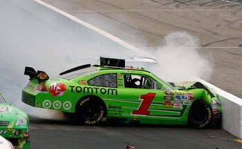 LOUDON, NH - JUNE 28:  Martin Truex Jr., driver of the #1 TomTom Chevrolet, loses control and hits wall during the NASCAR Sprint Cup Series LENOX Industrial Tools 301 at New Hampshire Motor Speedway on June 28, 2009 in Loudon, New Hampshire.  (Photo by Ch