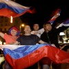 MOSCOW, RUSSIA - MAY 19:  Russian ice hockey fans celebrate victory in the streets after team Russia won the gold medal game against Canada at the 2008 IIHF World Hockey Championships in Canada, on May 19, 2008 in central Moscow, Russia.  (Photo by Epsilo
