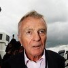 NORTHAMPTON, UNITED KINGDOM - JUNE 21:  F.I.A. President Max Mosley is surrounded by the media as he arrives in the paddock before the British Formula One Grand Prix at Silverstone on June 21, 2009 in Northampton, England.  (Photo by Paul Gilham/Getty Ima