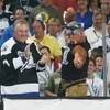 TAMPA, FL - MAY 25:  Hockey Hall of Famer Phil Esposito (L) applauds as professional wrestler Hulk Hogan gestures to his daugther Brooke Hogan who sang the National Anthem before the start of game one of the NHL Stanley Cup Finals between Calgary Flames a