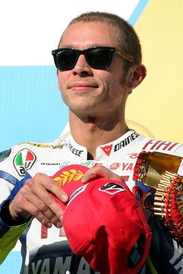 MOTEGI, JAPAN - APRIL 26:  Second-placed Valentino Rossi of Italy and Fiat Yamaha Team looks on from the podium after the MotoGP World Championship Grand Prix of Japan at the Twin Ring Motegi race circuit on April 26, 2009 in Motegi, Japan.  (Photo by Kiy