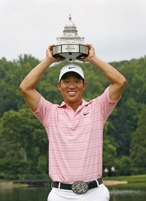 BETHESDA, MD - JULY 6: Anthony Kim holds the championship trophy after winning the AT&T National at Congressional Country Club on July 6, 2008 in Bethesda, Maryland. (Photo by Hunter Martin/Getty Images)