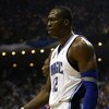 ORLANDO, FL - JUNE 14:  Dwight Howard #12 of the Orlando Magic reacts in the first quarter against the Los Angeles Lakers in Game Five of the 2009 NBA Finals on June 14, 2009 at Amway Arena in Orlando, Florida.  NOTE TO USER:  User expressly acknowledges 
