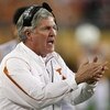 GLENDALE, AZ - JANUARY 05:  Head coach Mack Brown of the Texas Longhorns cheers his team during the Tostitos Fiesta Bowl Game against the Ohio State Buckeyes on January 5, 2009 at University of Phoenix Stadium in Glendale, Arizona.  (Photo by Jed Jacobsoh