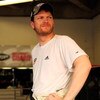DAYTONA BEACH, FL - JULY 02:  Dale Earnhardt Jr, driver of the #88 National Guard/AMP Energy Chevrolet, stands in the garage during practice for the NASCAR Sprint Cup Series Coke Zero 400 at Daytona International Speedway on July 2, 2009 in Daytona Beach,