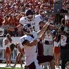 AUSTIN, TX - NOVEMBER 24:  Quarterback Stephen McGee #7 of the Texas A&M Aggies celebrates his touchdown with Joey Thomas #81 during a game against the Texas Longhorns at Darrell K Royal-Texas Memorial Stadium November 24, 2006 in Austin, Texas. The Aggie