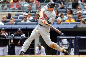 NEW YORK - MAY 17:  Justin Morneau #33 of the Minnesota Twins bats against the New York Yankees on May 17, 2009 at Yankee Stadium in the Bronx borough of New York City. The Yankees defeated the Twins 3-2 in ten innings.  (Photo by Jim McIsaac/Getty Images