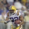 ATLANTA - DECEMBER 31:  Charles Scott #32 of the LSU Tigers carries the ball during the Chick-fil-A Bowl against the Georgia Tech Yellow Jackets on December 31, 2008 at the Georgia Dome in Atlanta, Georgia. (Photo by Kevin C. Cox/Getty Images)