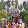 ANAHEIM, CA - JUNE 18:  In this handout provided by Disney, Lakers star and NBA Finals MVP Kobe Bryant waves to thousands of fans during a parade celebrating the 2009 World Champion Los Angeles Lakers at Disneyland on June 18, 2009 in Anaheim, California.