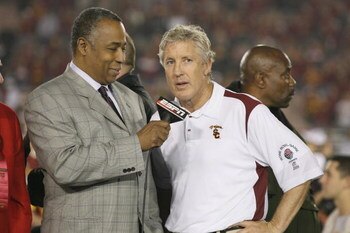 PASADENA, CA - JANUARY 1:  Head coach Pete Carroll of the USC Trojans is interviewed by John Saunders of ABC after the game against the Penn State Nittany Lions on January 1, 2009 at the Rose Bowl in Pasadena, California.  USC won 38-24.  (Photo by Jeff G