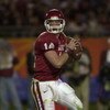 3 Jan 2001:  Quarterback Josh Heupel #14 of the Oklahoma Sooners rolls out of the pocket while playing the Florida State Seminoles during the Orange Bowl at Pro Player Stadium in Miami, Florida. DIGITAL IMAGE Mandatory Credit: Doug Pensinger/ALLSPORT