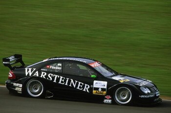 DONINGTON - MAY 19:  Warsteiner AMG Mercedes driver Marcel Fassler in action during the DTM German Touring Car Championship race held at Donington Park, in England on May 19, 2002. (Photo by: Bryn Lennon/Getty Images)