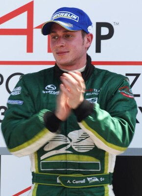TAUPO, NEW ZEALAND - JANUARY 25:  Adam Carroll  of Ireland on the podium following his win in the sprint race during the New Zealand A1 Grand Prix at the Taupo Race Track January 25, 2009 in Taupo, New Zealand.  (Photo by Ross Land/Getty Images)